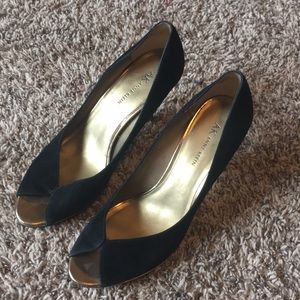 Black and gold Anne  Klein high heels.